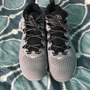 Nike Lacrosse Indoor cleats. Neutral enough that would work for a girl, too